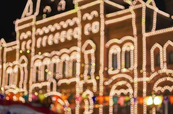 Blurred festive garland bright lights
