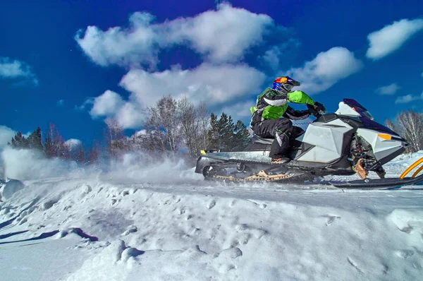 Snowmobile jump Stock Photos, Royalty Free Snowmobile jump Images ...