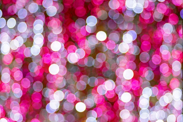 Holiday Lights Bokeh background. Abstract glitter lights pink and white, de-focused. Banner celebration bokeh glowing design