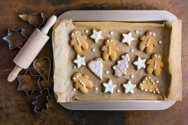 Homemade gingerbread on a baking tray.