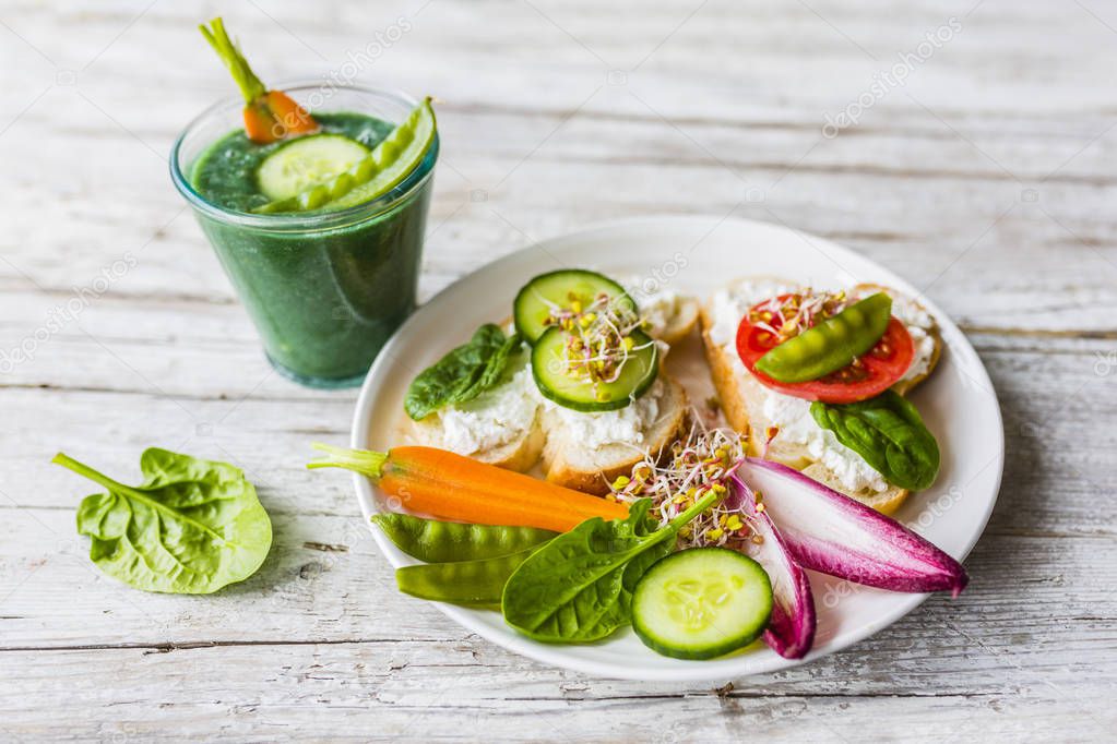 Delicious and healthy vegetarian breakfast with vegetable smoothie.