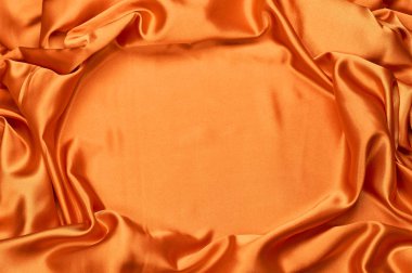 parlak turuncu ipek kumaş taşan
