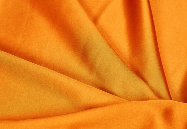 Jasny pomarańczowy tkaniny jedwabne, przepełnione — Zdjęcie stockowe