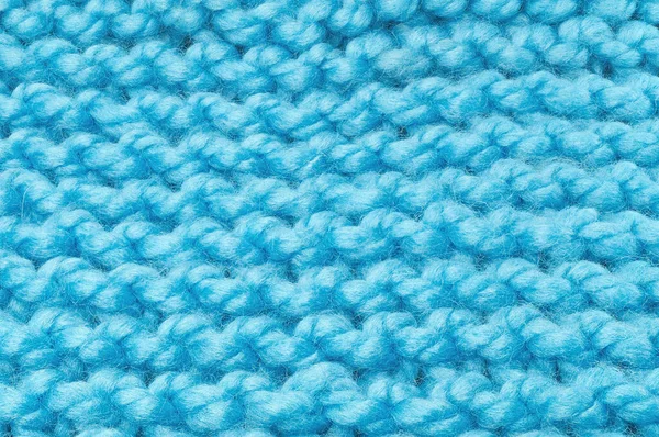 セーターやスカーフテクスチャ大編み物 レリーフパターンのニットジャージの背景 編み物で編組 ウール手編みや機械編みのパターン 生地の背景 — ストック写真