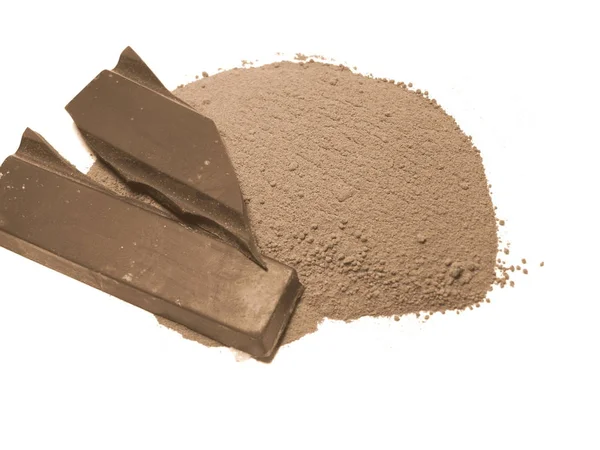 Κομμάτια σοκολάτας και σκόνη — Φωτογραφία Αρχείου
