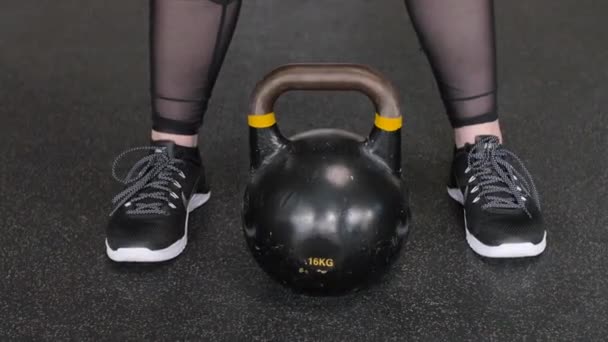 Chubby Woman Gym Lifts Black Kettlebell Working Out — Stock Video