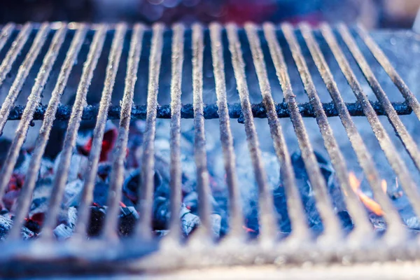 Metal grill for grilling on the charcoal grill in the open air.