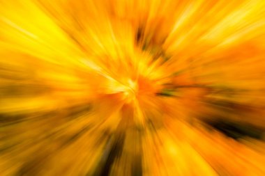 Abstract background with orange and yellow Zoom in effect. clipart
