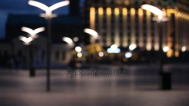 Unscharfer Hintergrund mit unscharfen Stadtlichtern — Stockvideo