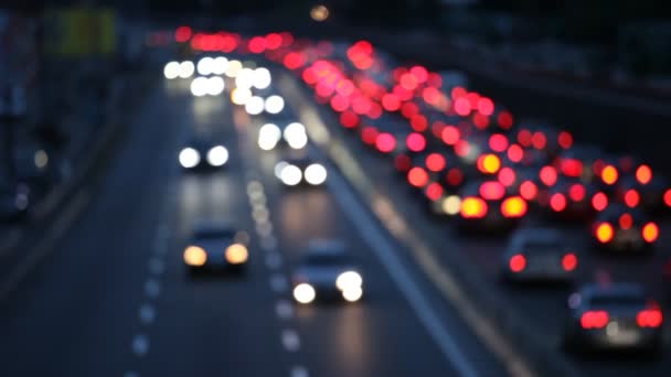 Out of focus background with blurry unfocused car and city light — Stock Video