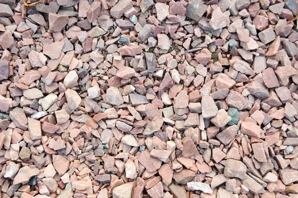 Rode scherpe stenen, graniet. De achtergrond — Stockfoto