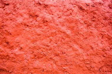 Beton kırmızı dışbükey taş doku duvar arka plan