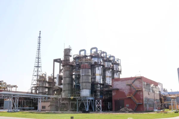 Chemical plant for the processing of petroleum products with rectification columns, reactors, heat exchangers, pipes, pumps at an oil refinery, petrochemical, chemical plant.