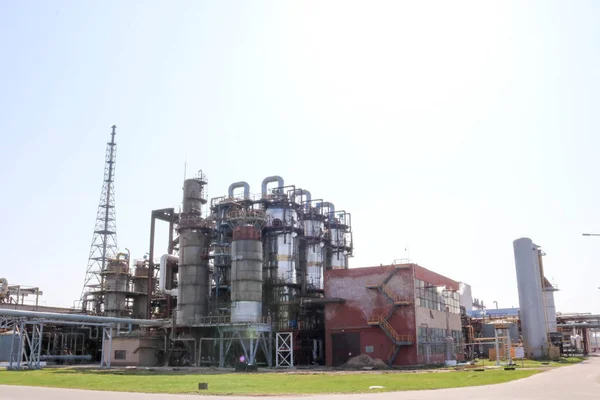 Chemical plant with rectification columns, reactors, heat exchangers, pipes, pumps, tanks, equipment at an oil refinery, petrochemical, chemical plant.