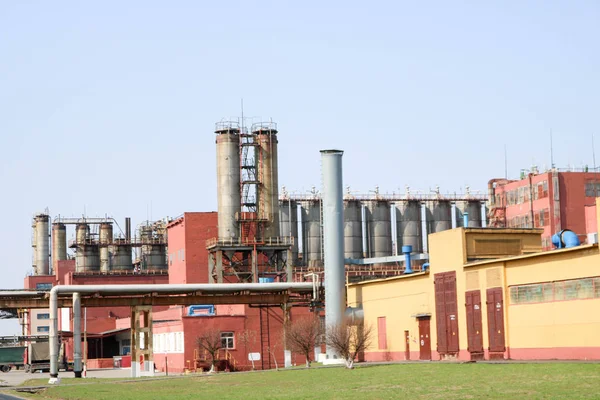 Chemical plant with rectification columns, reactors, heat exchangers, pipes, pumps, tanks, equipment at an oil refinery, petrochemical, chemical plant.