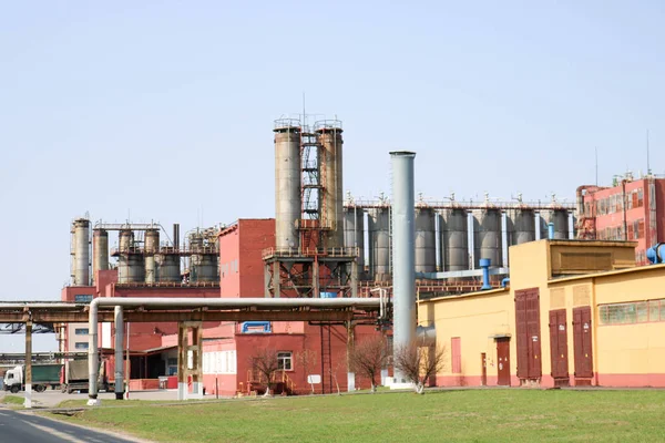 Chemical plant with rectification columns, reactors, heat exchangers, pipes, tanks, equipment, production buildings at a chemical plant.