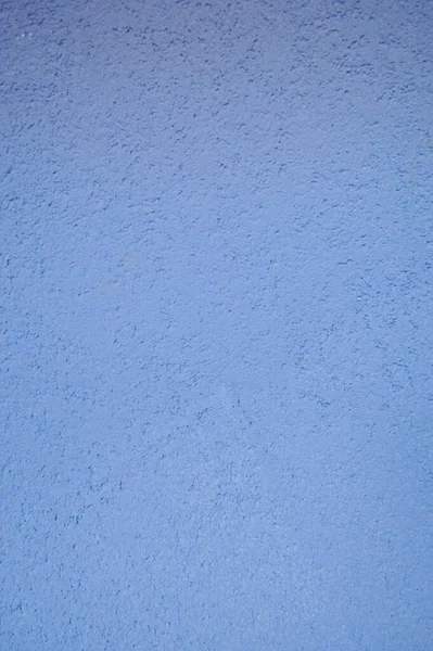 Wand aus blauem grob geprägtem Gebäude dekorativen Stuck. Textur, Hintergrund — Stockfoto