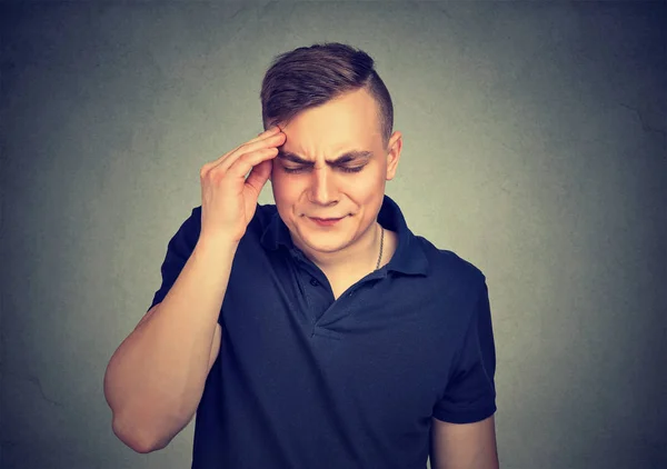 Young man having a headache — Stock Photo, Image