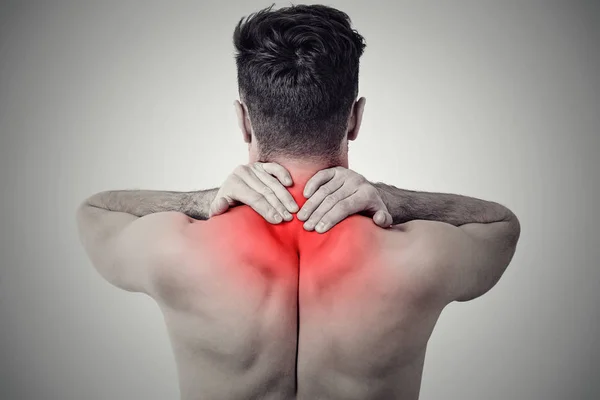 Anonymous man having pain in neck — Stock Photo, Image