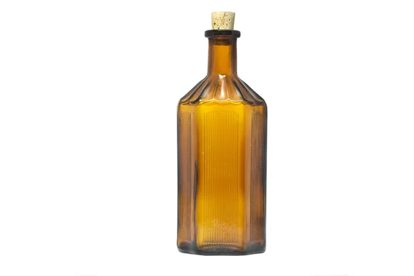 Bottiglia farmacia vintage con tappo su sfondo bianco — Foto Stock