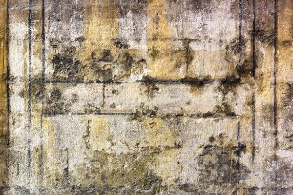 Altes Mauerwerk mit verblasster alter Malerei, kann als Hintergrund verwendet werden — Stockfoto