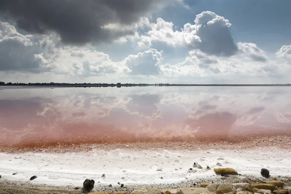Salt production in the Camargue district, Southern France, with reflections — Stock Photo, Image