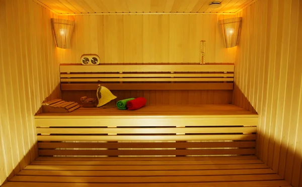 Sauna room with traditional sauna accessories