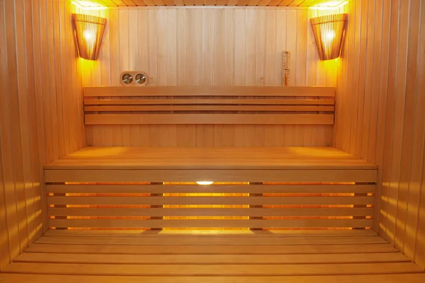 Sauna room with traditional sauna accessories