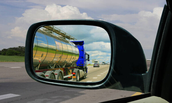 Truck in the rearview mirror.