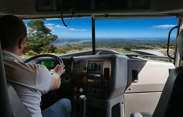 The truck driver on the road among fields highway. business trip — Stock Photo, Image