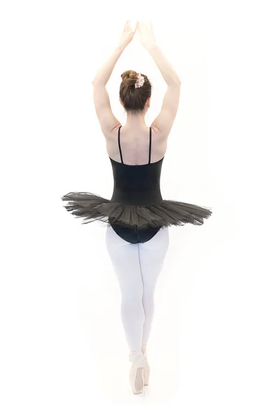 Bailarina de ballet posando sobre fondo blanco — Foto de Stock