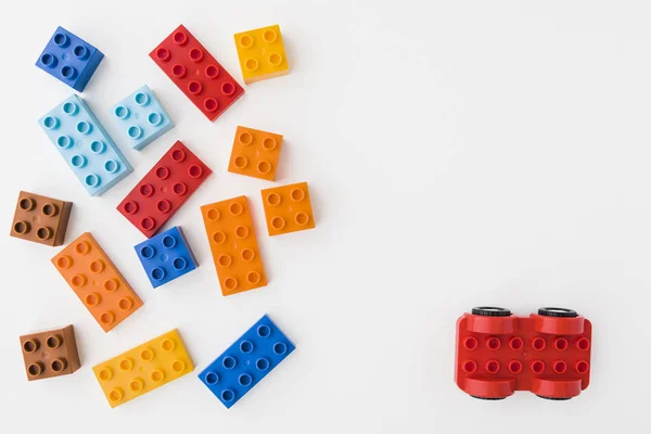 Colorful toy bricks on white background — Stock Photo, Image