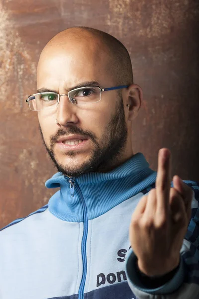 Portrait of a young bald man with a beard and glasses — Stock Photo, Image