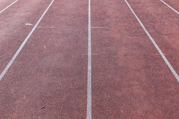 Linee bianche e consistenza della pista di corsa — Foto Stock