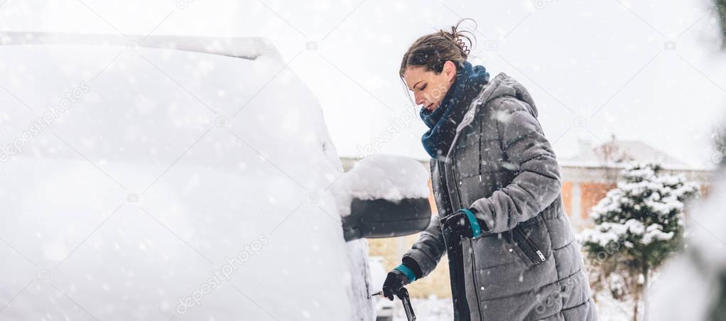 woman cleaning car