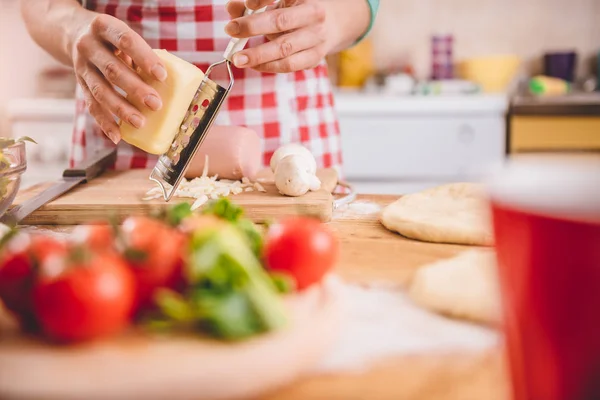 Woman Grating Cheese — Stock Photo, Image