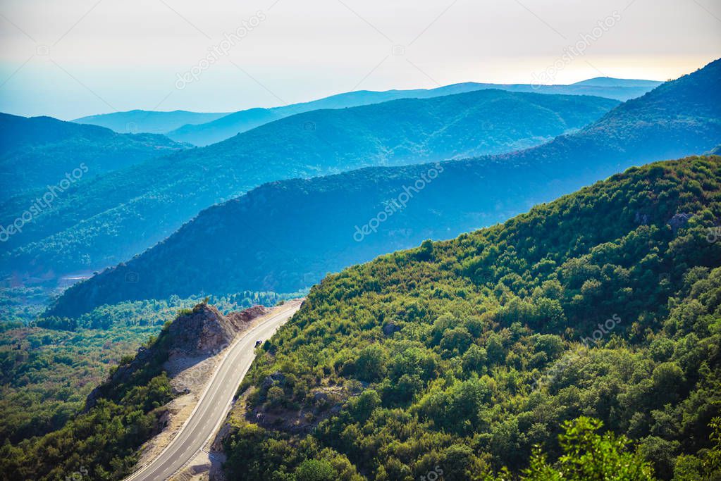 road and layers of mountains