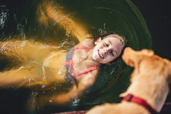 Girl Swimming River Dog Standing Dock — Stock Photo, Image