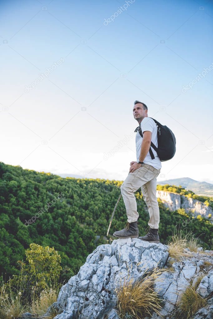 Hiker standing on mountain top