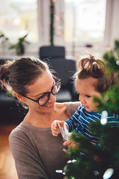 Mother holding daughter — Stock Photo, Image