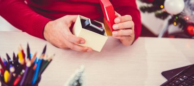 Man opening a gift box