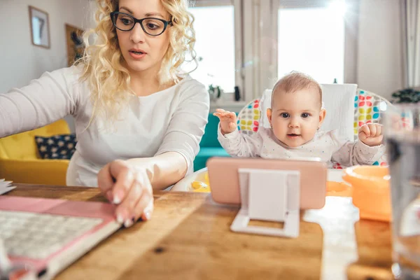 Mother Wearing Eyeglasses Working Home Office Laptop Taking Care Her — Stock Photo, Image