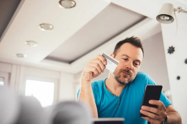 Man Paying Credit Card Smart Phone Home Office — Stock Photo, Image