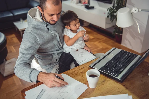 Father Working Home Office Holding Son His Lap — Stock Photo, Image