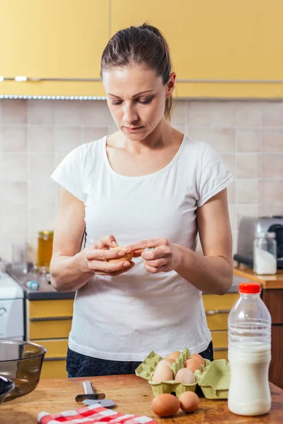 Woman Cracking Eggs Making Dough Home Kitchen — Stock Photo, Image