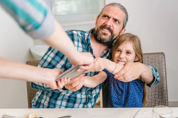 Mother Taking Digital Tablet Away Daughter Father — Stock Photo, Image