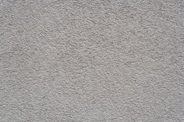 Işık gri sıva duvar. Dokusal arka plan. Yakın çekim.