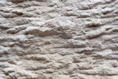 Antik kumlu kaba taş. Dokusal arka plan. Yakın çekim.