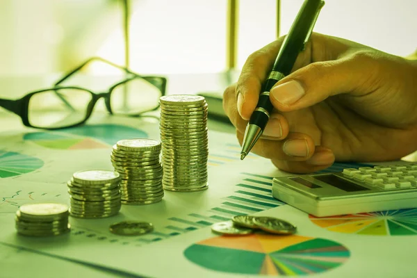 Concept of financial analysis with coins and graph — Stock Photo, Image