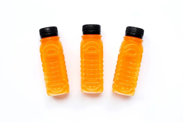Sinaasappelsap Plastic Flessen Witte Achtergrond — Stockfoto